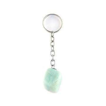 Amazonite keychain, tumbled green-blue stone attached to silver keyring on white background.